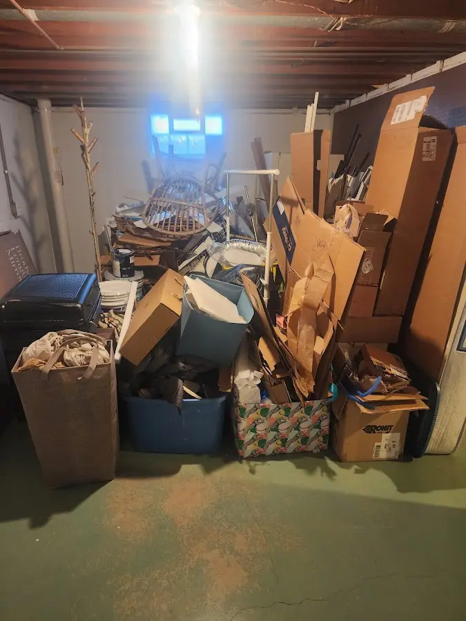 Roll-off dumpster container at job site for 2 Yard Dumpster Rental in Henderson